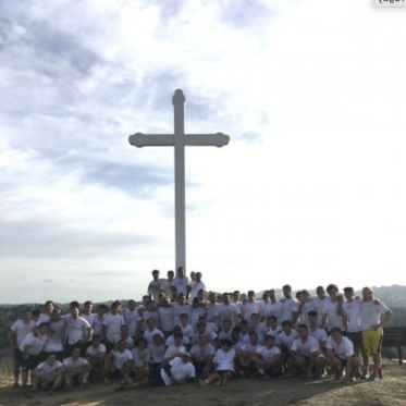 Rugby team photo at the cross
